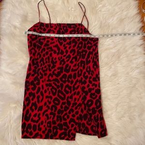 MOTEL Red Leopard mini dress with slit. NWT.